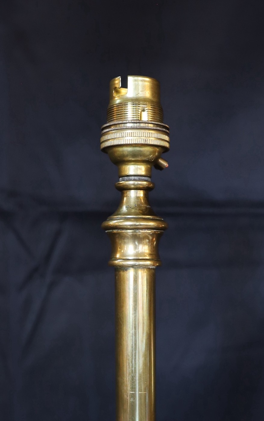 A late 19th century English brass telescopic lamp standard, height 146cm. width of base 43cm.